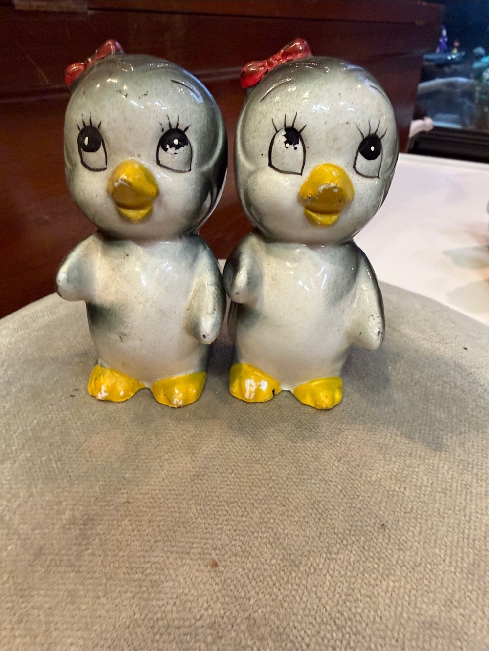 Vintage anthropomorphic ceramic penguin salt and pepper shakers. Made in Japan.